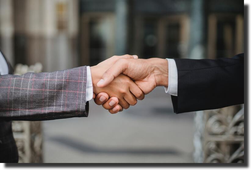two people shaking hands
