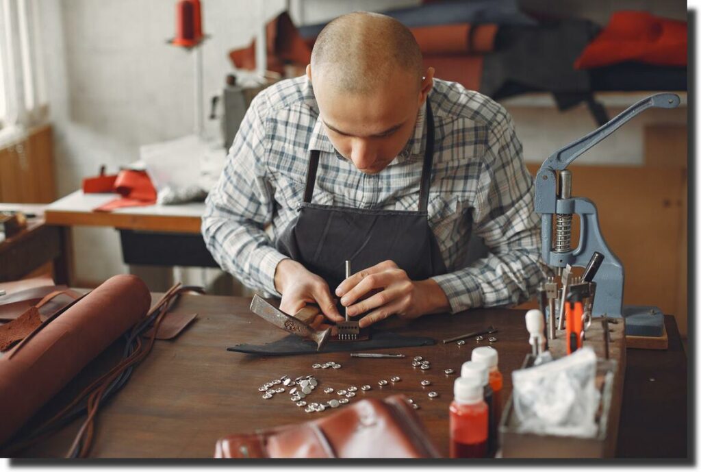 the guy works in a workshop